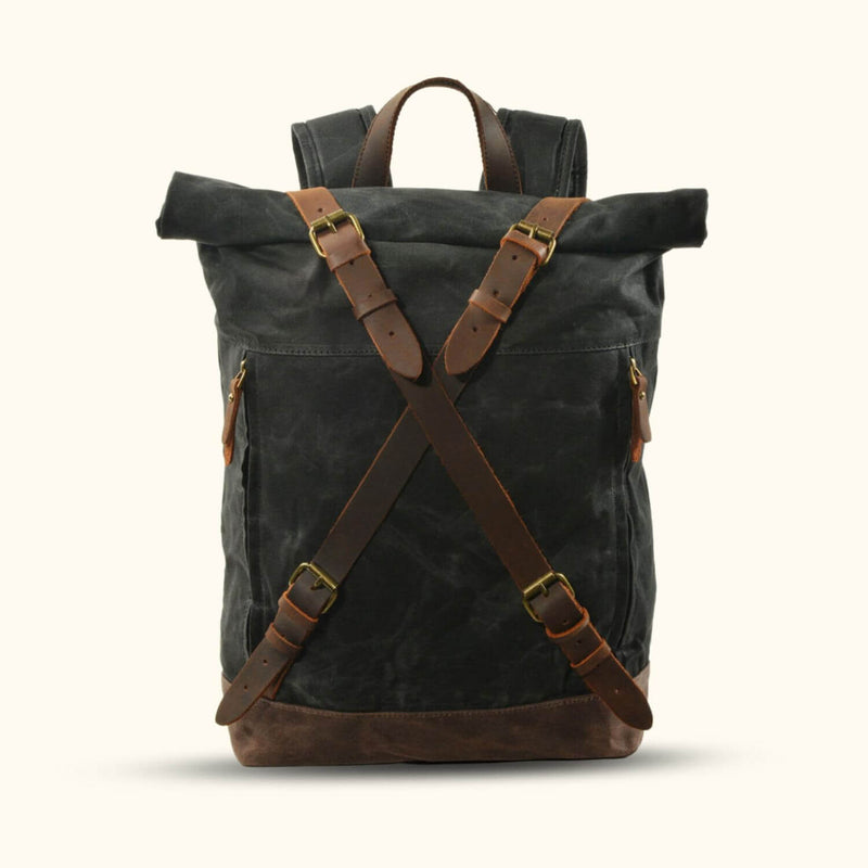 Black Waxed Canvas Rucksack - Embrace a sleek and rugged look with this black waxed canvas rucksack. Designed for durability and style, it features a spacious interior, adjustable straps, and a weather-resistant finish. Perfect for everyday use or outdoor adventures, this rucksack combines functionality and fashion effortlessly.