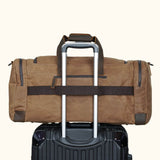 Waxed Canvas Weekender Bag with Trolley Strap - Your versatile travel companion with added convenience.