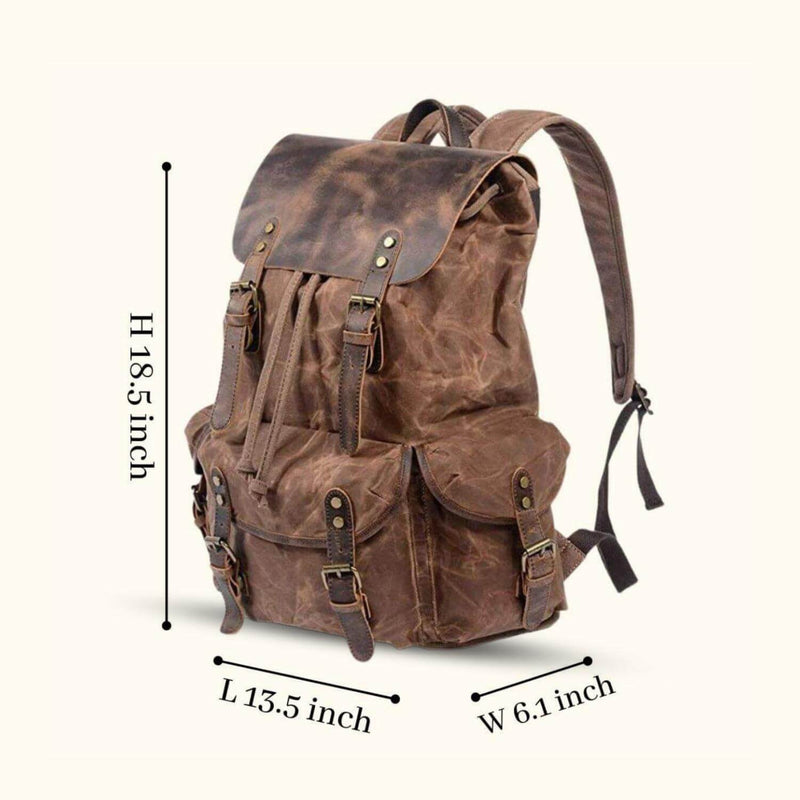 18" Waxed Canvas and Leather Backpack - Experience the perfect fusion of durability and style with this spacious backpack, designed to withstand your adventurous journeys.