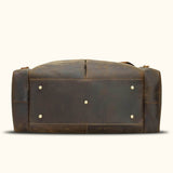 Timeless elegance: brown leather duffle bag.
