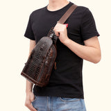 Model wearing the Croc Ridge Leather Sling Bag - Gator Style, showcasing the intricate crocodile pattern on rich brown leather.