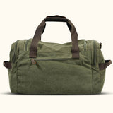 Green Canvas Bag: A versatile bag made from durable green canvas material, suitable for various purposes such as shopping, carrying personal items, or as a fashion accessory.