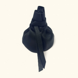Soft full-grain leather drawstring pouch for coins, jewelry, or small accessories.