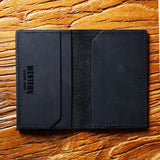 Open view of The Rancher's Legacy Black Cardholder showing the smooth leather and inner compartments for cards.
