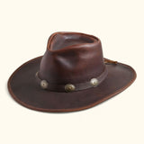 Front angled view of the Walker full-grain leather hat with antique concho band and classic Western brim shape