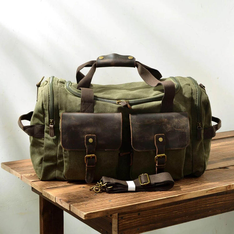 Green Canvas Duffle Bag: A versatile and vibrant duffle bag in an appealing green color, made from durable canvas material, suitable for various activities, including travel, sports, or everyday use.