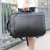 The Stetson Peak - Expandable Men's Leather Backpack in black, being carried by a person in a white t-shirt and black shorts, showcasing its versatility and stylish design.
