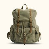 Army Green Canvas School Backpack - Vintage-inspired, trendy, and functional backpack for students and beyond.