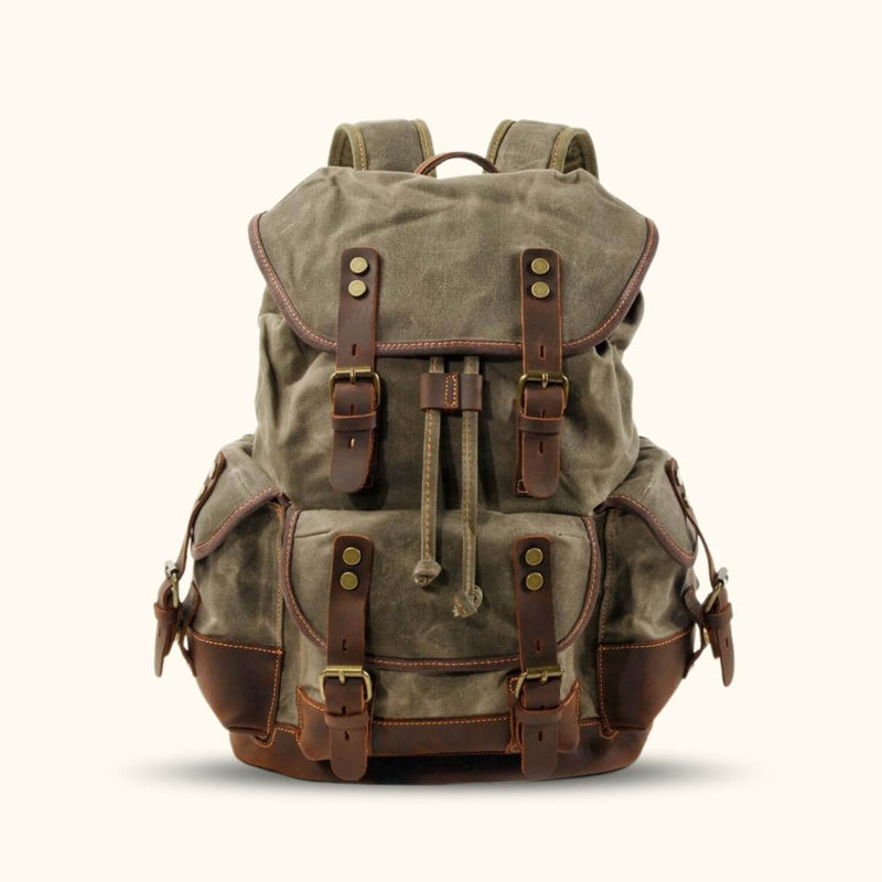 Army Green Vintage Canvas Backpack - Embrace a rugged and timeless look with this army green vintage canvas backpack, perfect for adventurers seeking style and durability.