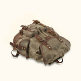 Army Green Vintage Waxed Canvas Backpack - Embrace the rugged and timeless appeal of this army green vintage backpack, crafted with durable waxed canvas for adventurous journeys.