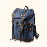Blue Vintage Canvas Hiking Backpack - Explore the wilderness with a touch of vintage charm, as this durable and stylish backpack becomes your trusted companion on hiking expeditions.