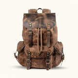Brown Waxed Canvas Leather Backpack - Embrace rugged elegance with this brown backpack crafted from waxed canvas and genuine leather.