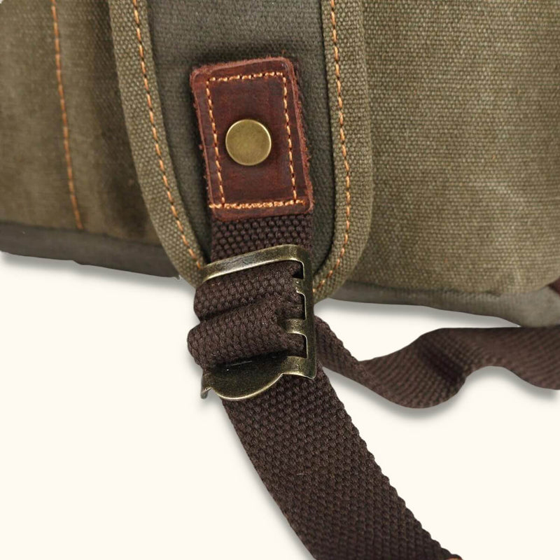 Canvas Leather Strap - Embrace a rugged yet refined look with this versatile canvas backpack featuring a durable leather strap, offering both style and functionality for your everyday adventures