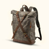 Canvas Roll Top Backpack - Experience the perfect blend of style and functionality with our canvas roll top backpack. Crafted with durable canvas material, this backpack offers a spacious main compartment and a convenient roll top closure for easy access. The adjustable straps ensure a comfortable fit, making it ideal for daily commutes, outdoor adventures, and travel. Stay organized and stylish with this versatile and reliable canvas backpack.