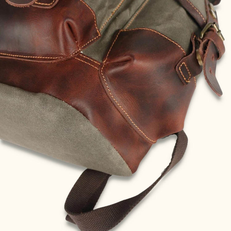 Canvas and Leather Backpack - Experience the perfect blend of durability and sophistication with this stylish canvas and leather backpack, ideal for both casual outings and professional settings.