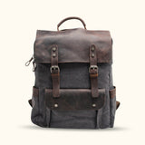 Gray Canvas Laptop Backpack - A sleek and versatile choice, this gray canvas backpack is designed to protect and carry your laptop and essentials in modern style.
