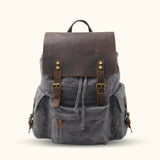 Gray Unisex Canvas Backpack - A sleek and gender-neutral option, designed to complement any style while being highly practical and reliable.