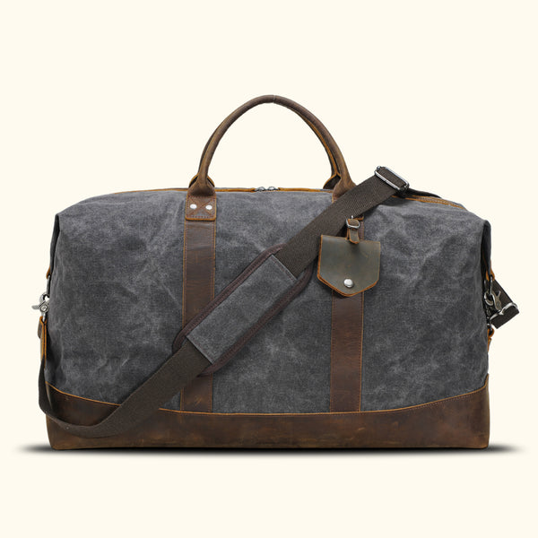 Gray Waxed Canvas Duffel Bag - A sophisticated and durable travel companion.