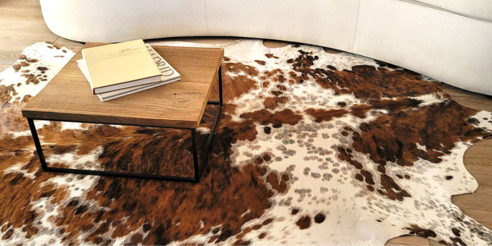 Real cowhide rug showcased in a contemporary living space.