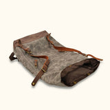 Roll-Top Canvas Backpack - Durable and stylish backpack made with waxed canvas material, ideal for outdoor adventures and everyday use.