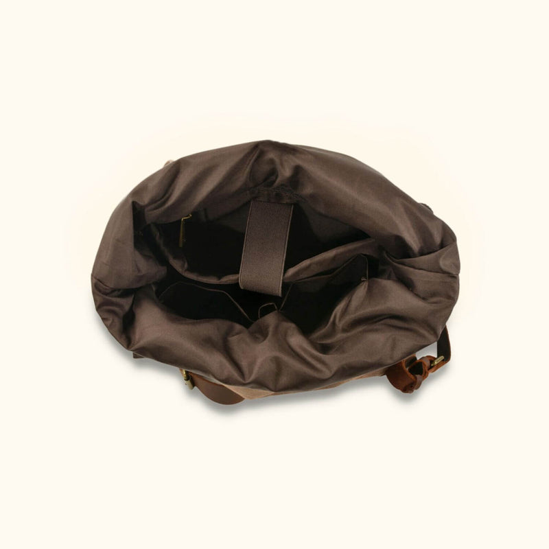 Roll-Top Canvas Rucksack - Durable and stylish backpack with a roll-top closure, ideal for everyday use and outdoor adventures.