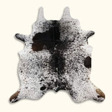 Texas Range Salt and Pepper Cowhide Rug in Black and White, featuring a bold natural speckled pattern.