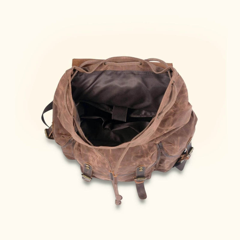 Waxed Canvas Leather Backpack - Discover the perfect blend of durability and style with this versatile backpack crafted from waxed canvas and genuine leather.