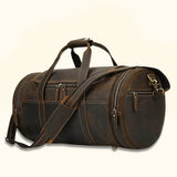 Sophisticated barrel leather bag: a blend of style and function.