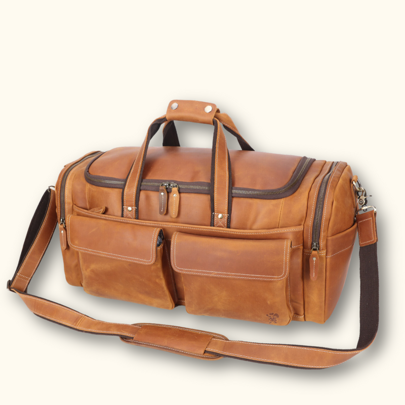 Premium leather duffle bag, crafted with the utmost attention to detail and quality materials, offering superior durability, timeless style, and unmatched functionality, making it the ultimate choice for discerning travelers.
