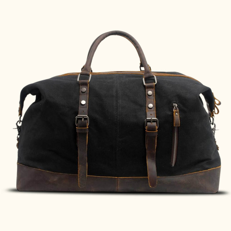 Black Canvas Carry-On Bag: A sleek and stylish carry-on travel bag crafted from durable black canvas, designed for convenient and fashionable travel.