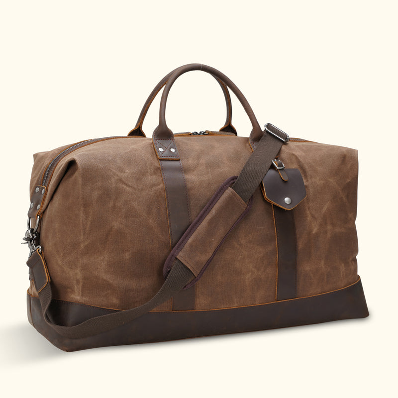 Brown Canvas Leather Duffel Bag - A blend of materials for enduring style and functionality.
