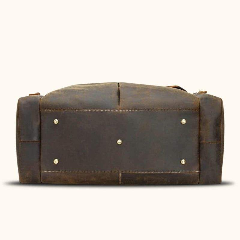 Timeless elegance: brown leather duffle bag.