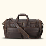 Discover timeless elegance with a brown leather duffle bag, your versatile and sophisticated travel companion.