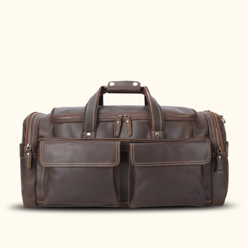 Versatile brown leather travel bag, designed for the modern explorer, blending rugged durability with sophisticated style to accompany you on any journey with ease and elegance.