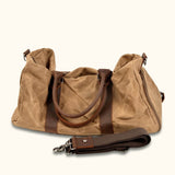 Canvas and Leather Bag with Shoe Compartment: A stylish and functional bag crafted from a blend of canvas and leather, featuring a dedicated shoe storage compartment for added convenience.