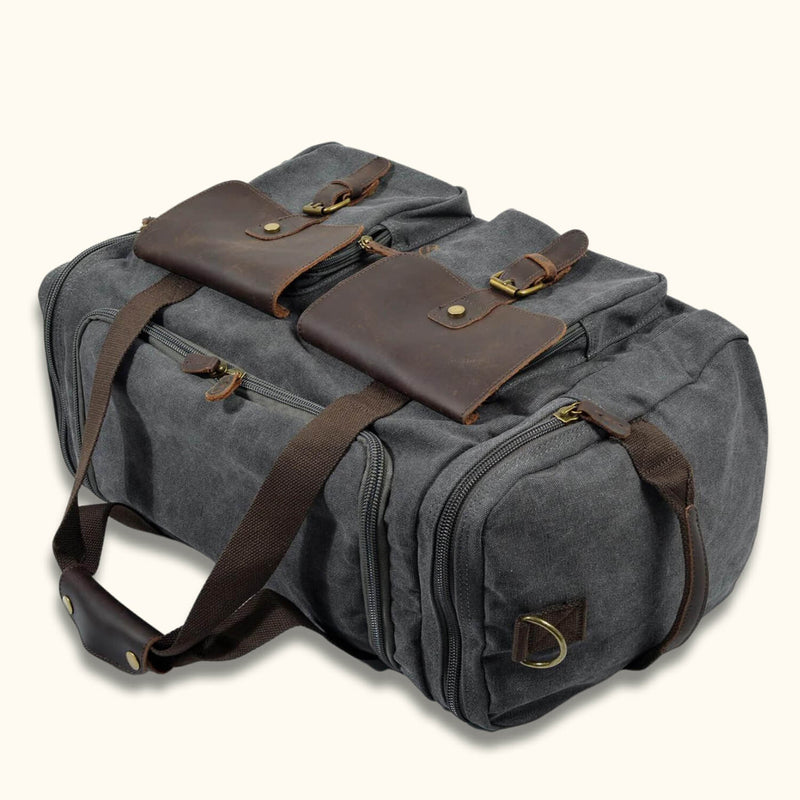 Canvas Overnight Bag: A compact and versatile bag designed for short trips and one-night stays, made from durable canvas material, ideal for carrying essential items and clothing.