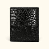 The Compact Crocodile Wallet in black showing the natural crocodile scale pattern across the back exterior