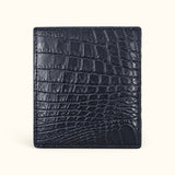 The Compact Crocodile Wallet in Deep Navy showing the natural crocodile scale pattern across the back exterior