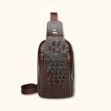 Front view of the Croc Ridge Leather Sling Bag - Claw Style, featuring the detailed crocodile pattern on rich brown leather with dual zipper compartments.