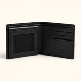 Interior view of The Monarch Crocodile Bifold Wallet in Obsidian Black featuring full-grain calf leather lining, eight card slots, and an ID window.
