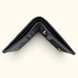 Crocodile wallet top view showing two separate cash compartments and layered construction