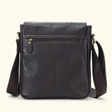 Back view of The Dustwalker full-grain cow leather crossbody iPad bag featuring rear zipper pocket and adjustable shoulder strap.