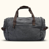 Gray Canvas Bag: A versatile bag crafted from durable gray canvas material, suitable for various purposes such as shopping, carrying personal items, or as a fashion accessory.