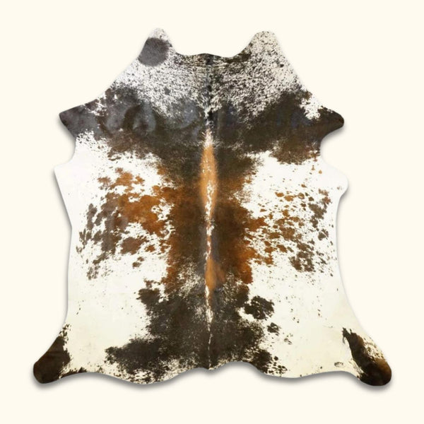 Large Brazilian cowhide rug for living room, featuring tricolor salt and pepper design.