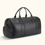 Refined black leather duffel bag featuring YKK zippers, designed for both sophistication and durability.