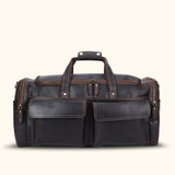 Sleek leather duffel bag, the epitome of sophistication and functionality, designed to accompany you on your travels with style and durability, offering ample storage and a timeless aesthetic.