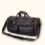 Refined leather men's duffle bag, combining timeless style with practical functionality, designed to accompany you on all your adventures with durability and sophistication.