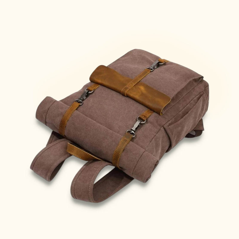 Soft Canvas Leather Backpack - A perfect blend of comfort and sophistication, this backpack features a soft canvas body paired with luxurious leather accents, offering style and durability for your daily adventures.