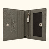 The Compact Crocodile Wallet in taupe green with full-grain leather interior, card slots, YKK zip pocket and ID window