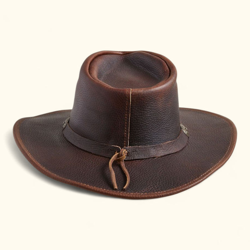 Back angled view of the Walker full-grain leather hat showcasing the rear band detail and Western brim shape